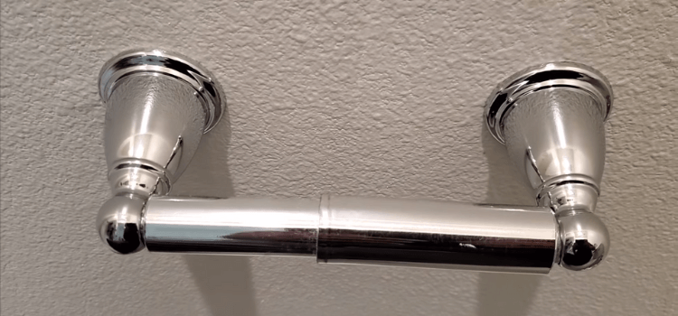 How to remove toilet paper holder from wall no screws